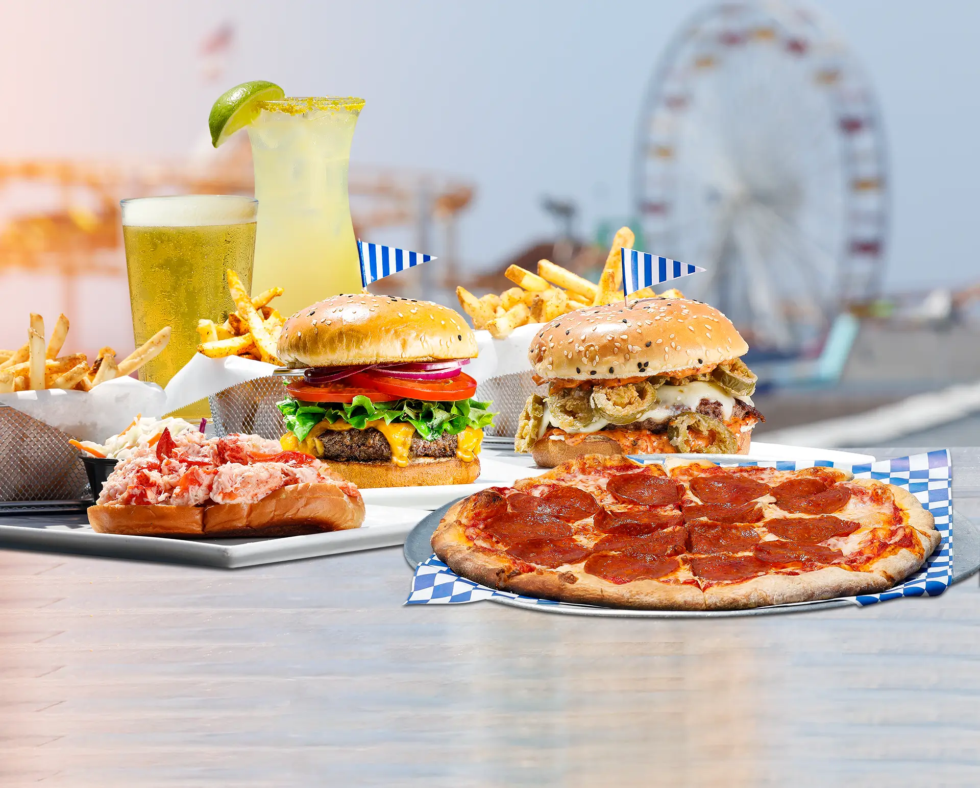 Burgers, pizza, and lobster roll with drinks